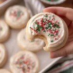 Delicious Christmas sugar cookies inspired by Crumbl recipe, decorated with icing.