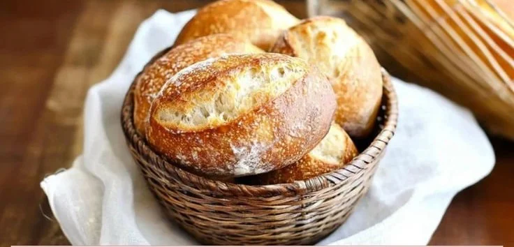 No-knead German crusty rolls fresh out of the oven, ready to be served.