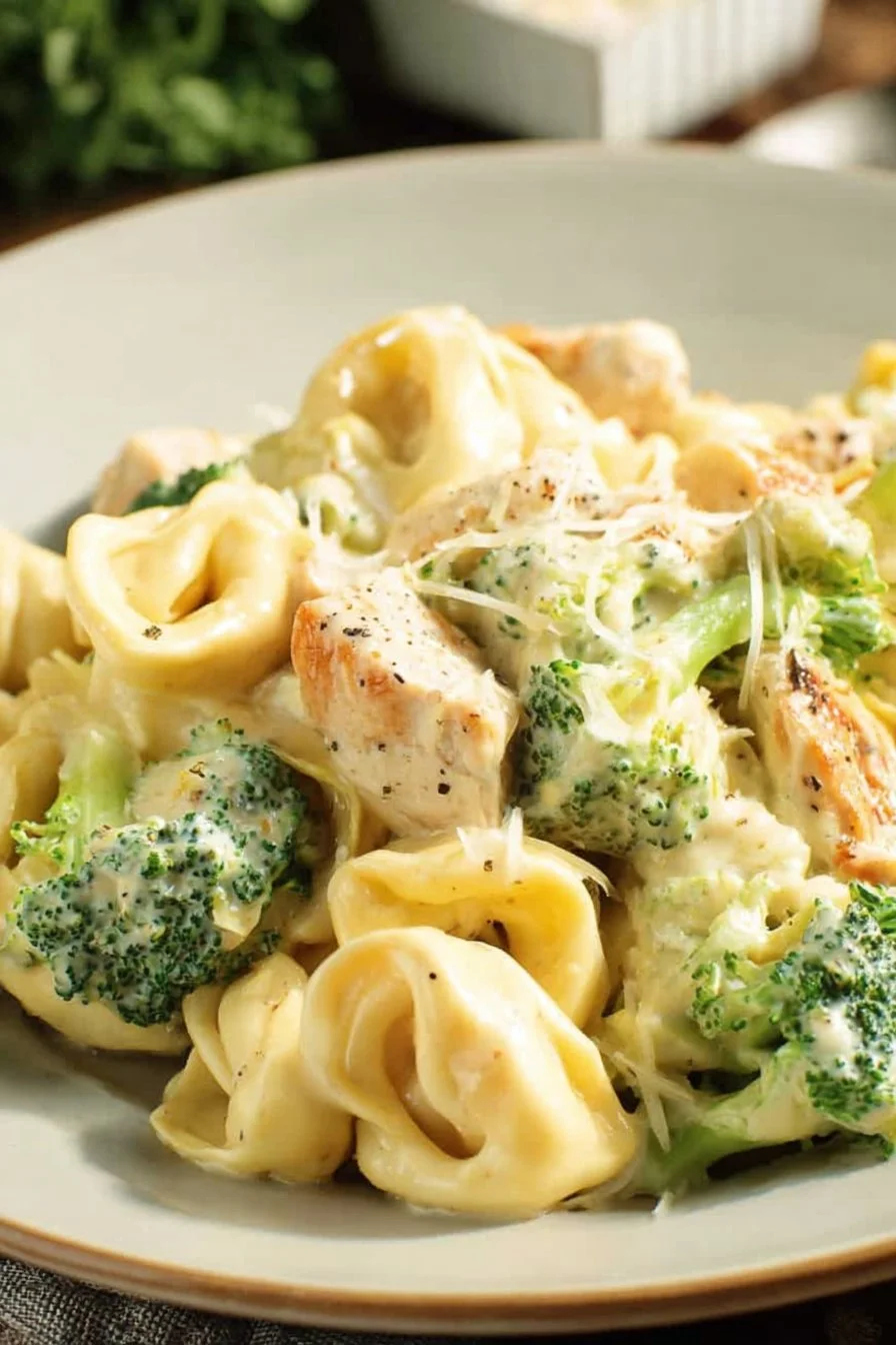 Delicious Cheesy Chicken Broccoli Tortellini served in a bowl