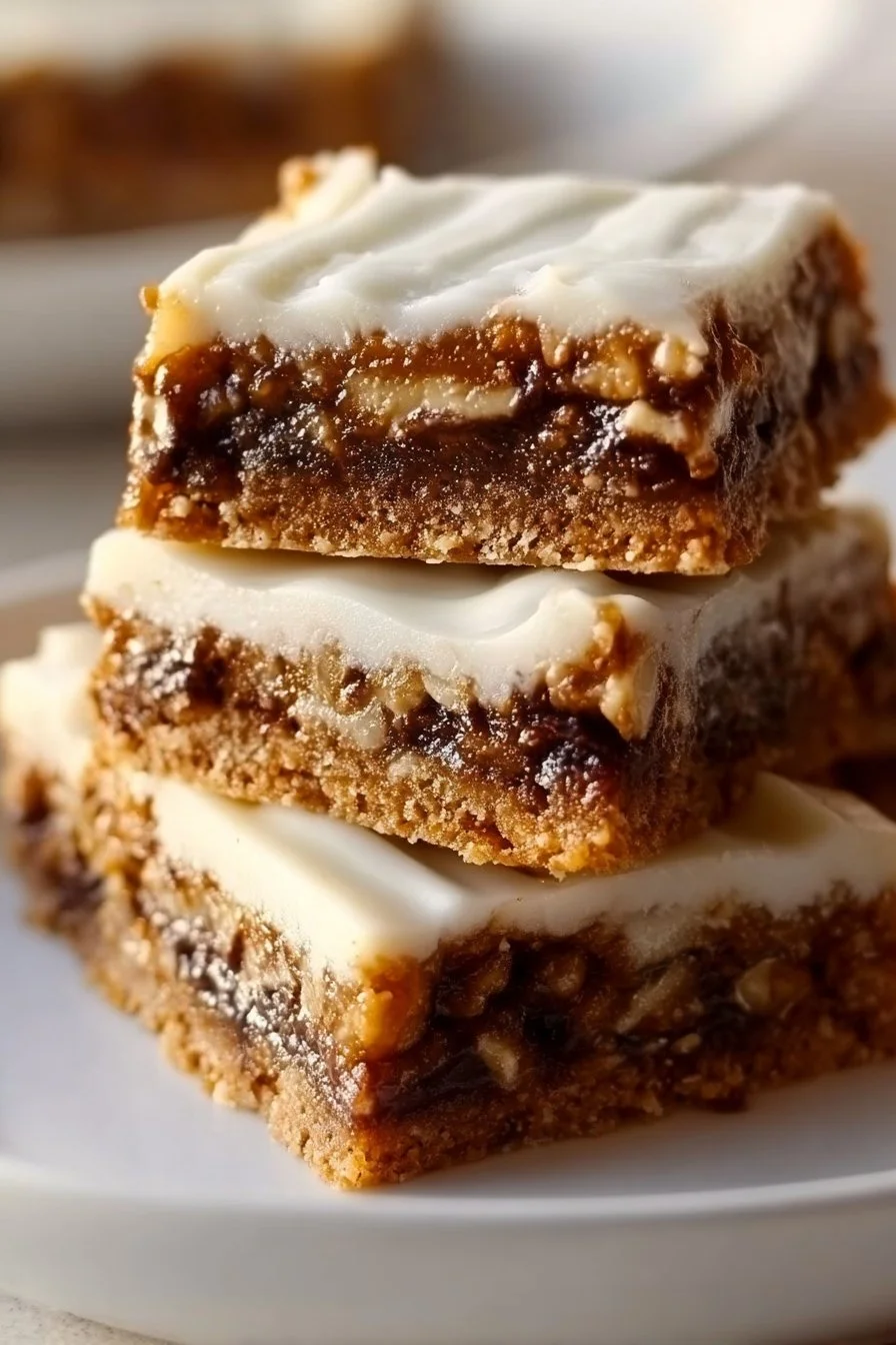 Delicious Cinnamon Roll Bliss Bars layered with cream cheese icing and cinnamon sugar.