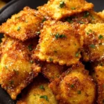 Plate of crispy Fried Ravioli served with marinara sauce
