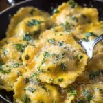 Delicious homemade creamy mushroom ravioli served on a plate