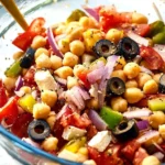 Delicious Italian chickpea salad with fresh vegetables and herbs