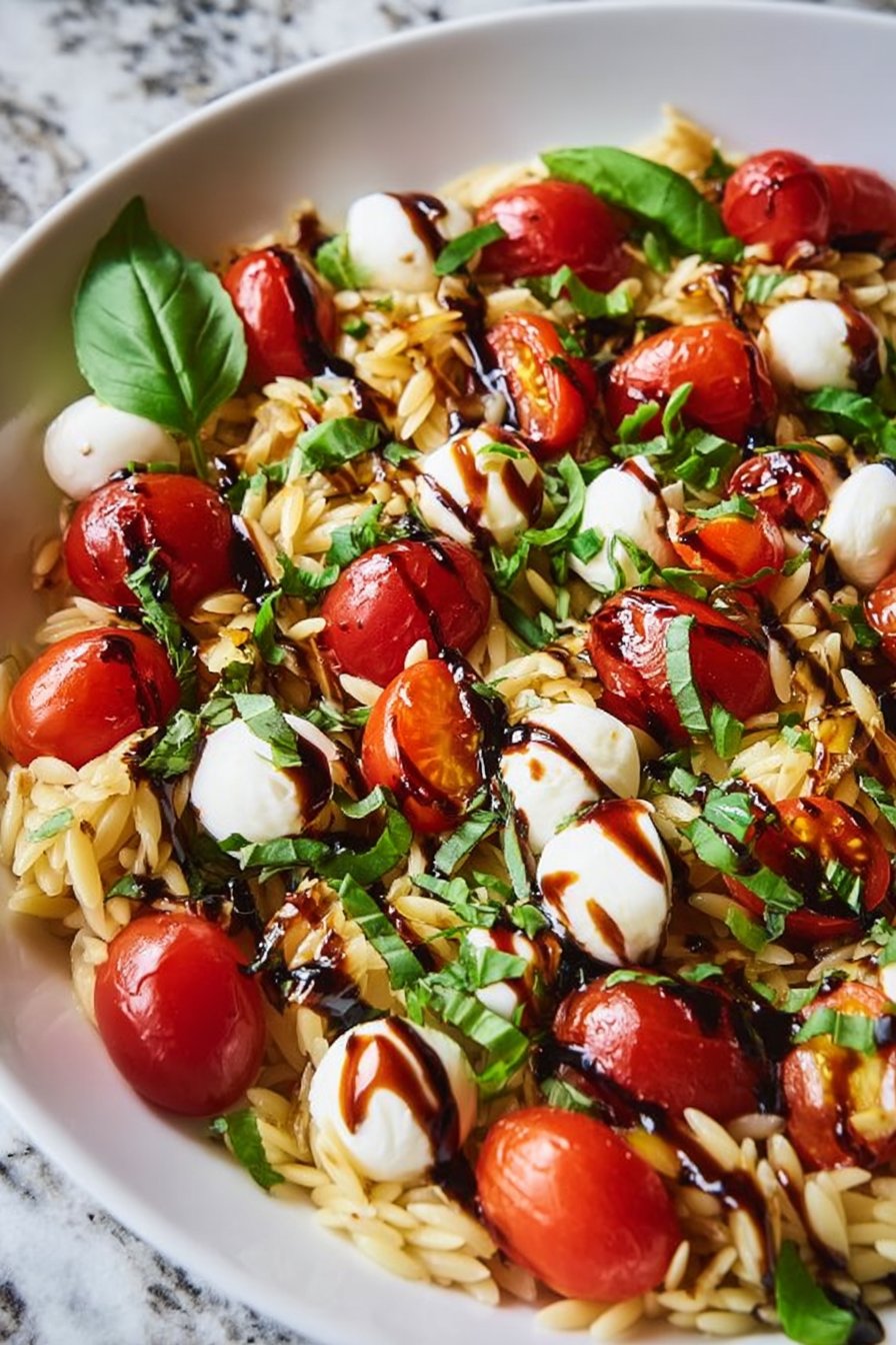 Caprese Orzo Salad with Balsamic Glaze delights your taste buds!