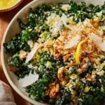 Freshly prepared Lemon Parm Kale Salad with lemon dressing and parmesan cheese
