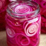 Bowl of quick pickled red onions ready for serving