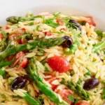 Shrimp Asparagus Orzo Pasta Salad with fresh ingredients in a bowl