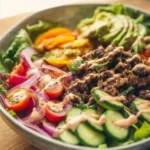 Whole 30 Burger Bowl with fresh vegetables and grilled beef